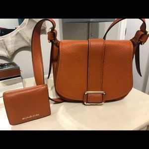 Michael Kors Orange Maxine satchel bag and wallet.